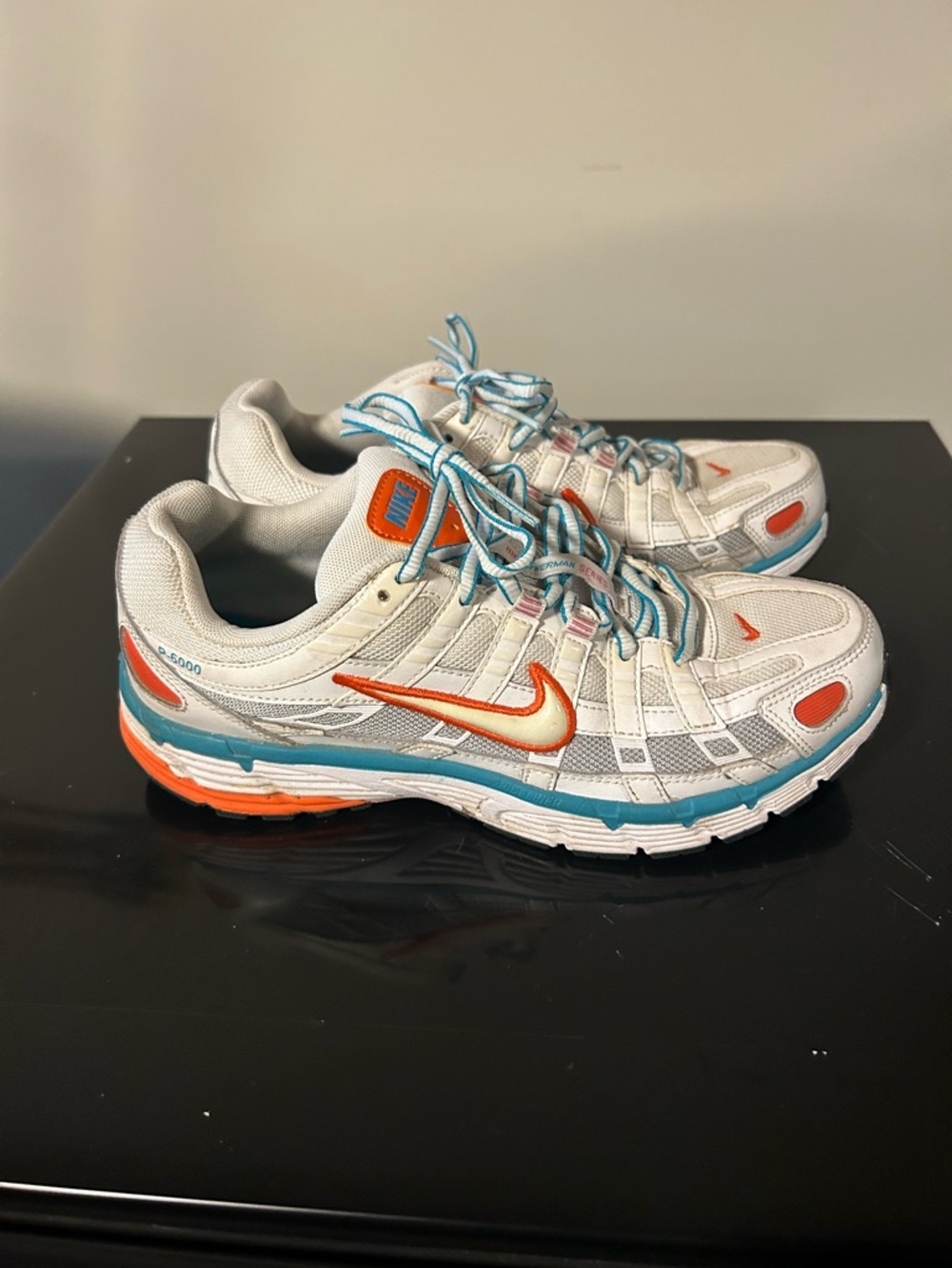 Nike White Sneakers with Orange and Teal Accents - Picture 2 of 5